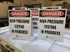 Danger high pressure testing sandwich boards