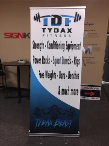 This image shows retractable banner stand for fitness sign.
