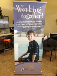 This image shows retractable banner stand with banner.