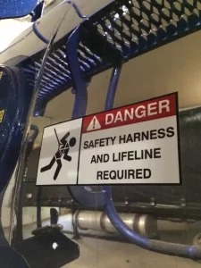 This image shows safety harness decal.