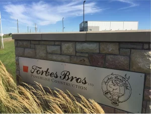 This image shows stone wall company sign.