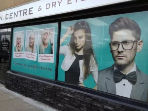 This image shows store front window vision graphics.