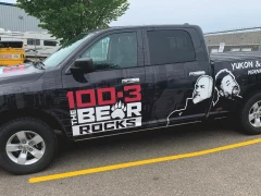 100.3 The Bear Truck Wrap This image shows 100.3 the bear truck wrap.
