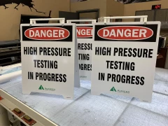 Danger High Pressure Testing Sandwich Boards Danger High Pressure Testing Sandwich Boards. This is part of SignKore's Sandwich Boards collection, featuring sandwich boards, A-frame signs, sidewalk signs, portable signs, pavement signs.