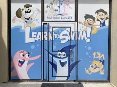 Perforated View Through Window Graphics For Paul Sadler Swimland Perforated View Through Window Graphics For Paul Sadler Swimland. This is part of SignKore's Window/Vinyl Lettering collection, featuring window lettering, vinyl lettering, window graphics, storefront window signs, glass decals.