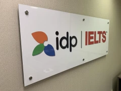 Aluminum Office Sign Reception Behind Desk This image shows aluminum office sign reception behind desk.