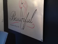 Business Sign With Stand Off Hardware This image shows business sign with stand off hardware.