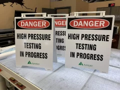 Danger High Pressure Testing Sandwich Boards Danger High Pressure Testing Sandwich Boards. This is part of SignKore's Sandwich Boards collection, featuring sandwich boards, A-frame signs, sidewalk signs, portable signs, pavement signs.