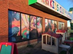 Daycare Window Perforation Vinyl And Awning Signage This image shows daycare window perforation vinyl and awning signage.