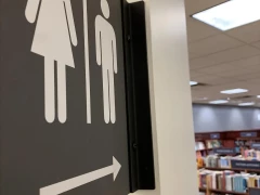 Extruding Washroom Sign This image shows extruding washroom sign.